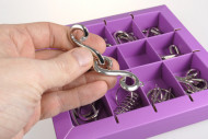 Набор головоломок Metall Puzzles violet Eureka 3D Puzzle 473359, 10 головоломок                    