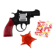 Іграшковий револьвер з пістонами та значком 