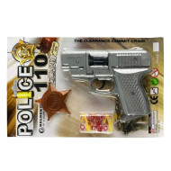 Іграшковий пістолет з пістонами та значком 